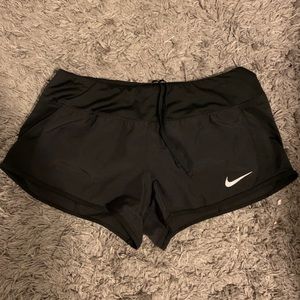 Black Nike lined running shorts